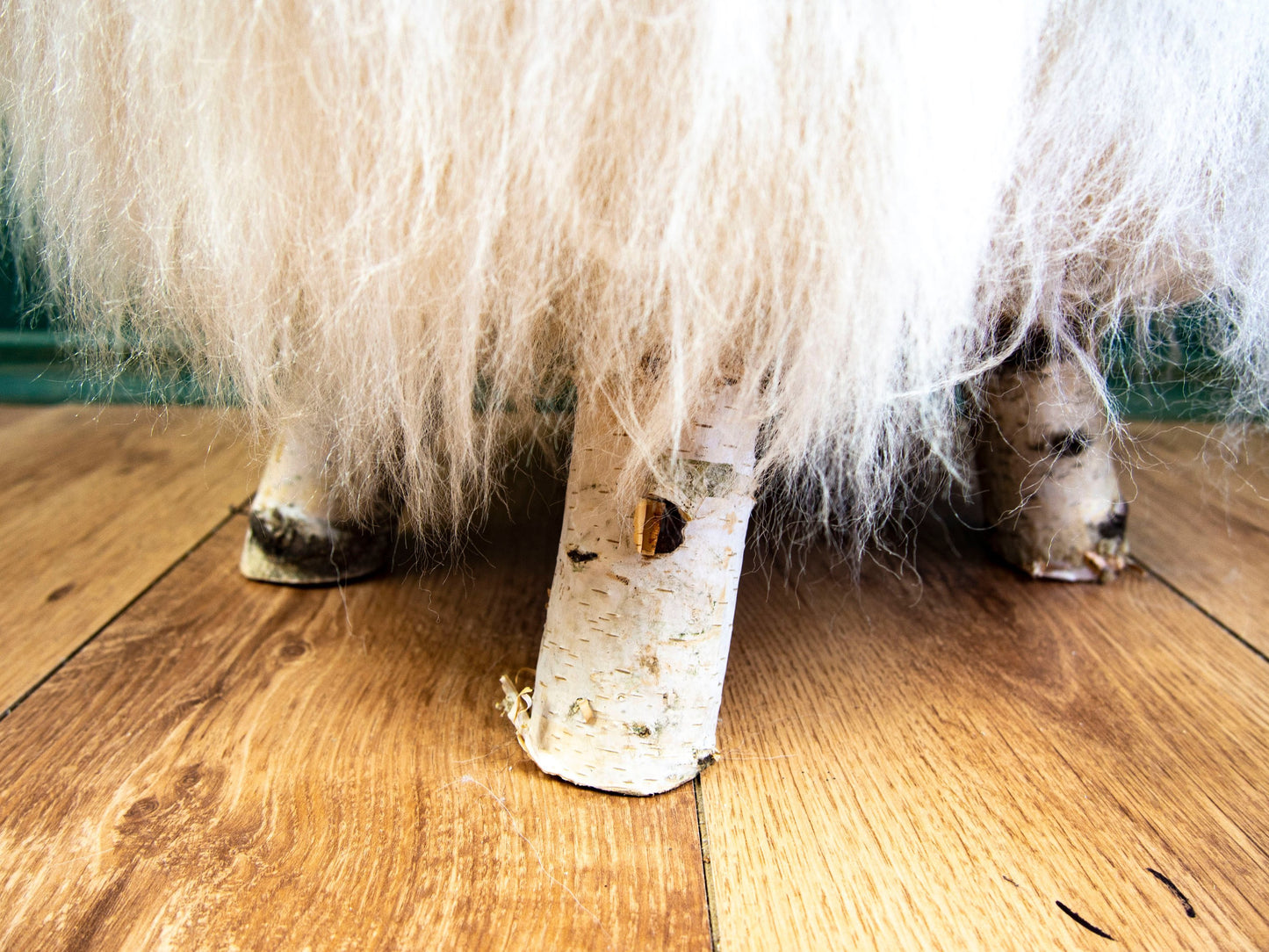 Birch Wood and Ivory sheepskin ottoman